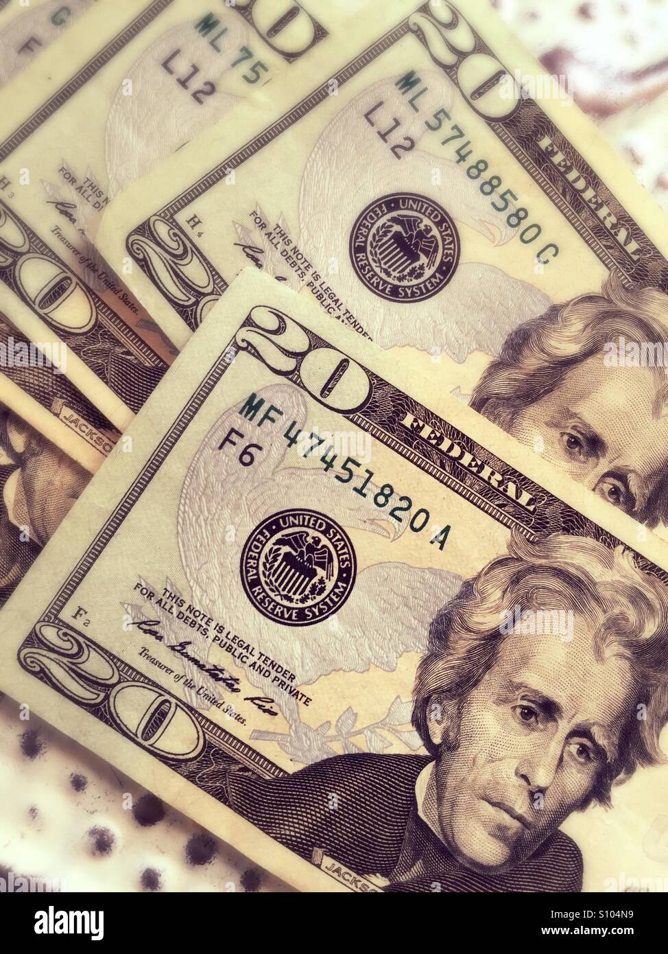 $20 bills featuring Andrew Jackson. - Smartphone Captured Stock Image