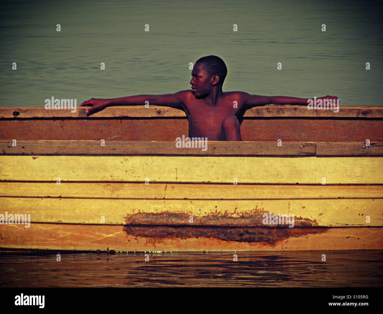 Boy boat hi-res stock photography and images - Alamy