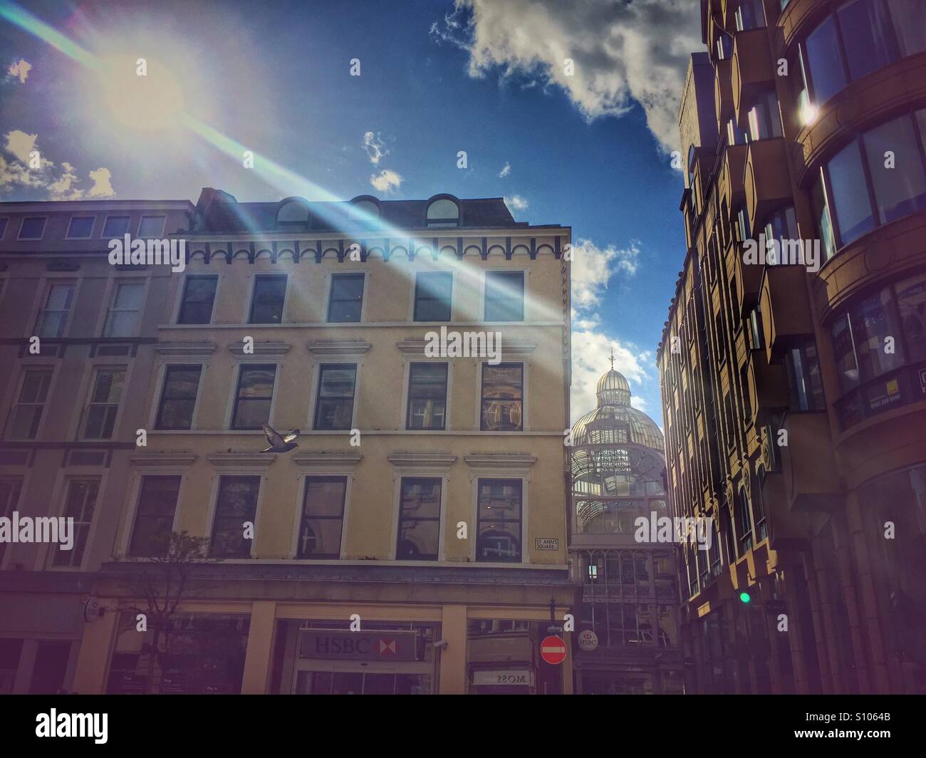 Sun beaming down into St Anne's square, Manchester Stock Photo