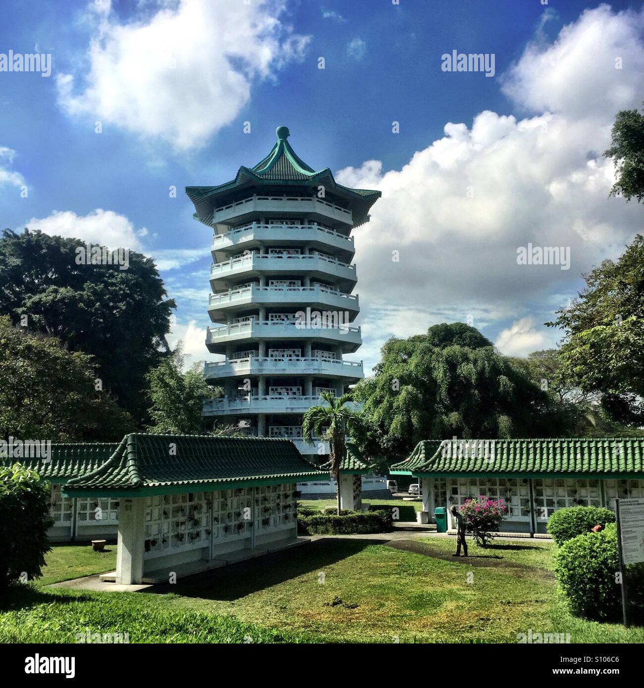 A pagoda emerges in the background in a Chinese cemetery columbarium Stock Photo