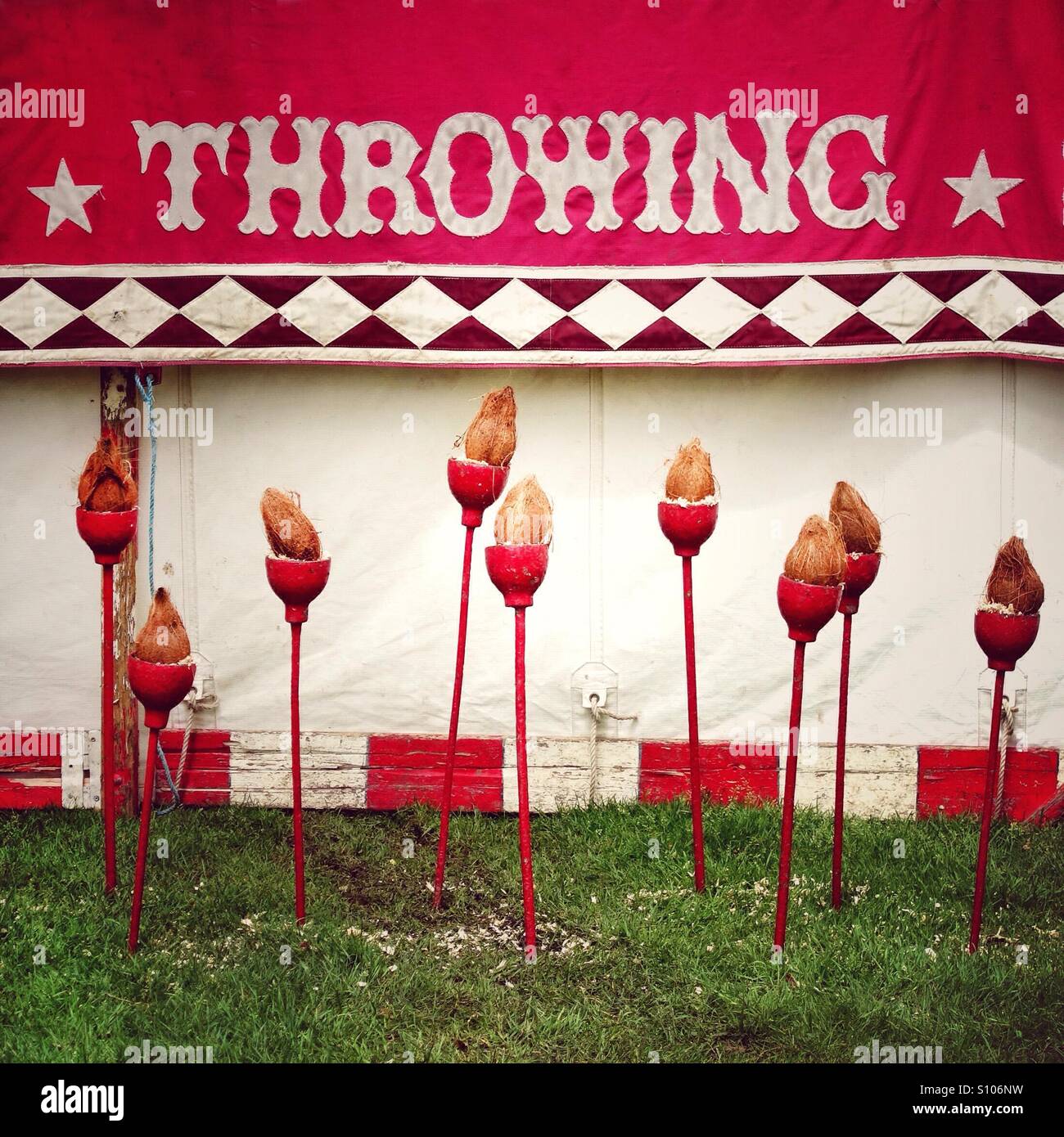 Old fashioned coconut shy Stock Photo Alamy