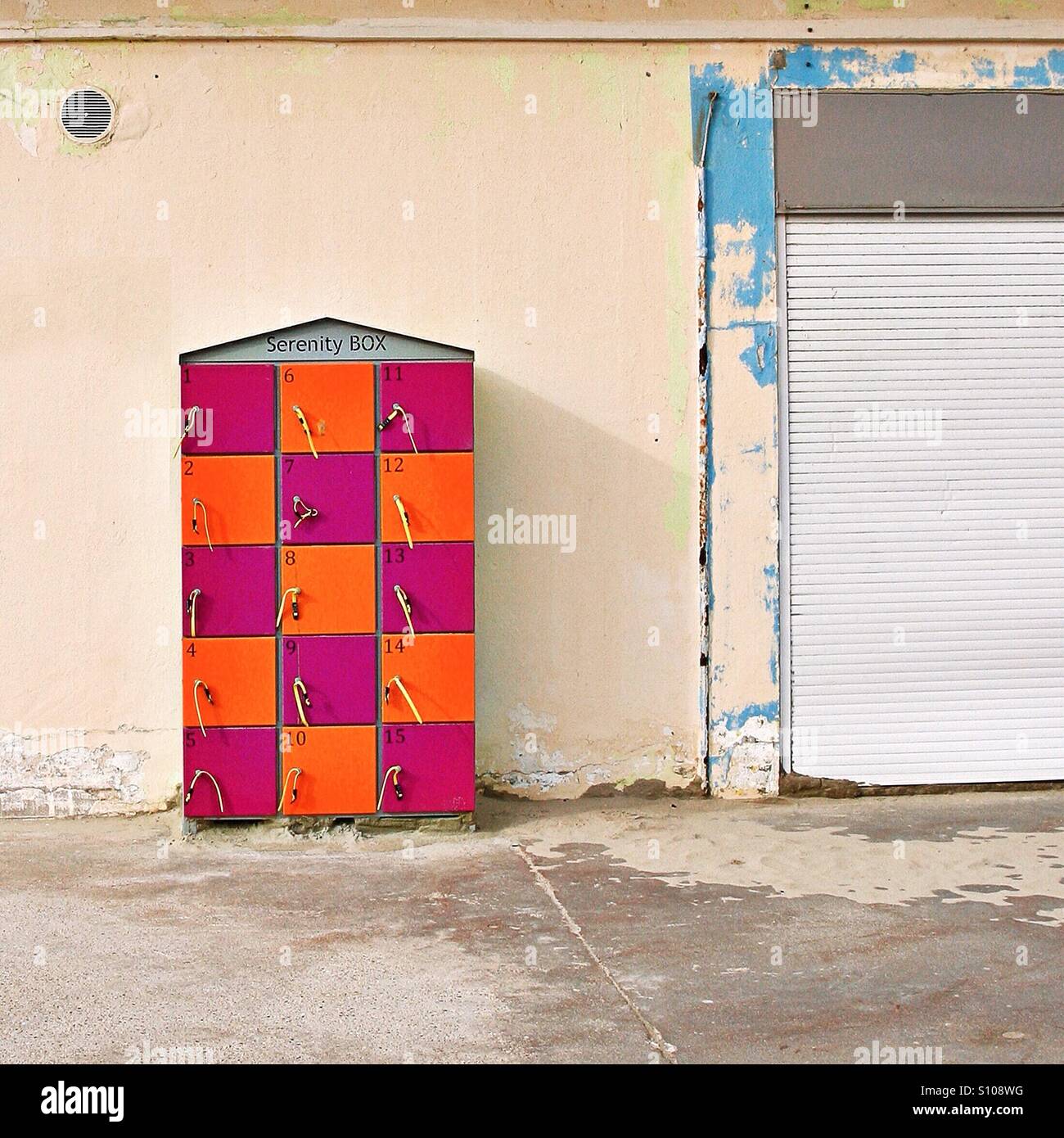 Brightly coloured beach lockers Stock Photo Alamy
