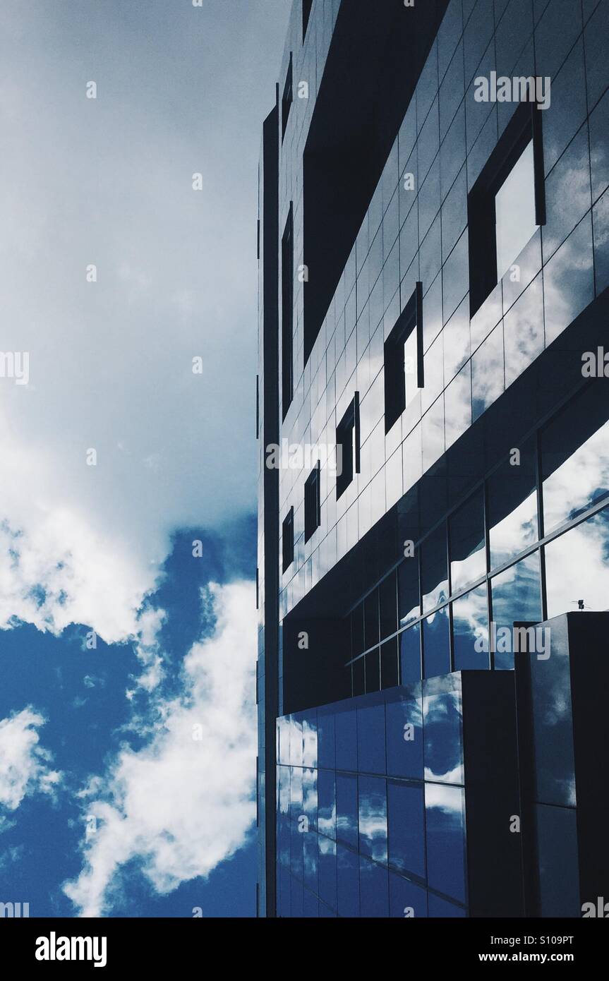 Modern building under cloudy sky Stock Photo - Alamy