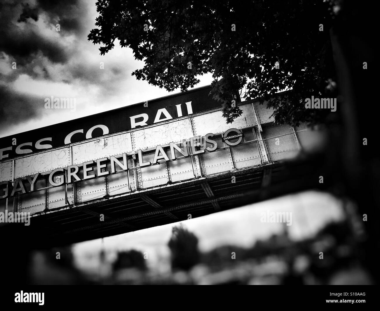 Cargo train going over Bridge. Harringay, Green Lanes, London, U.K. Stock Photo