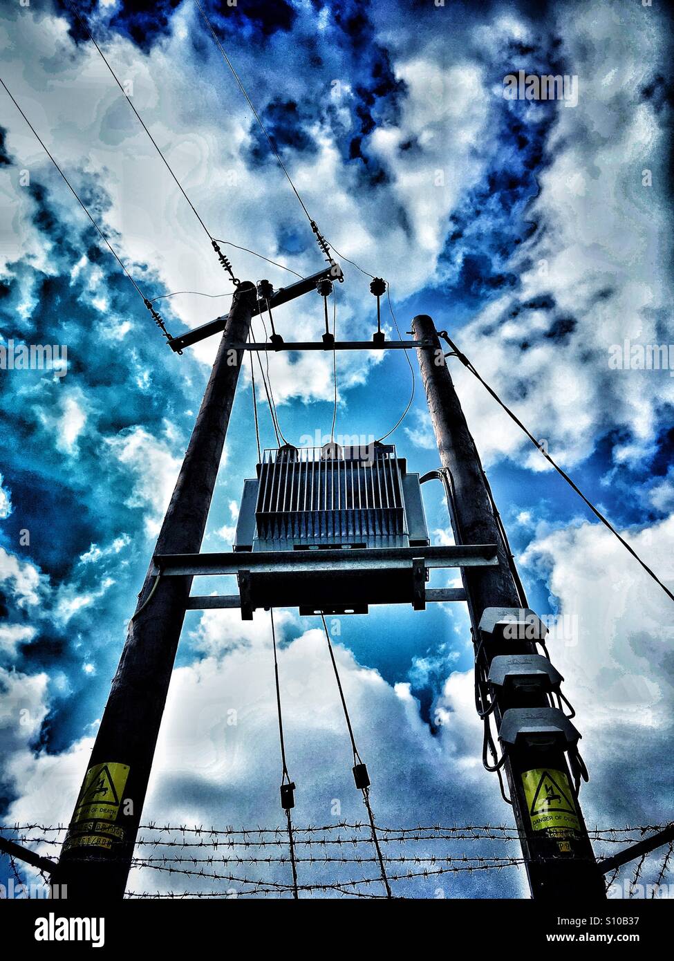 Transformer with overhead power cables Stock Photo Alamy
