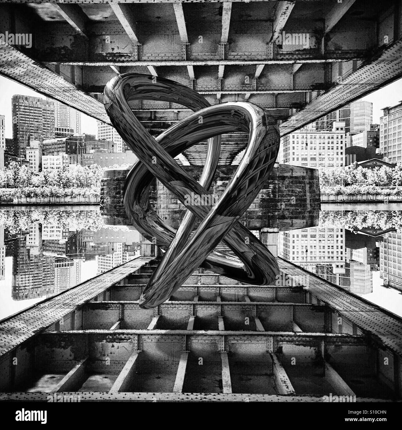 An abstract black and white image of the underside of a bridge with a futuristic metal object and a city skyline. Stock Photo