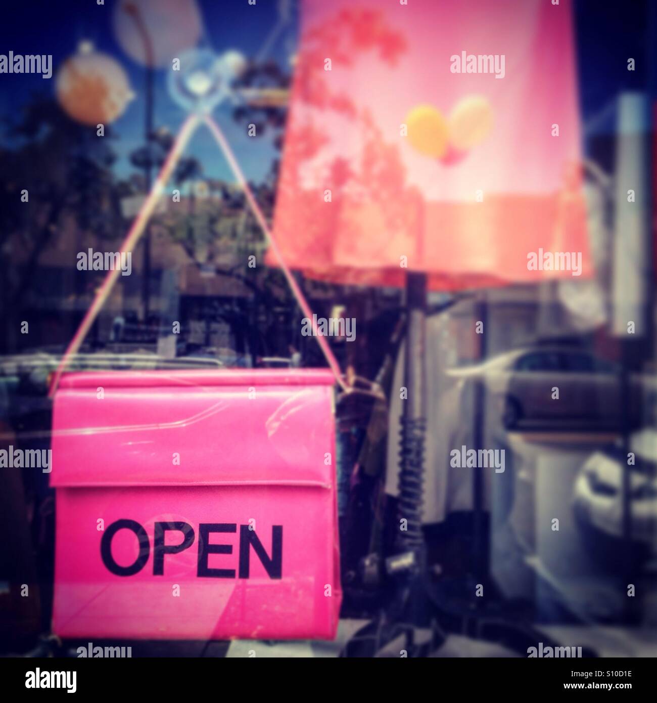 Open sign on a consignment store in Berkeley, California. - Smartphone Captured Stock Image