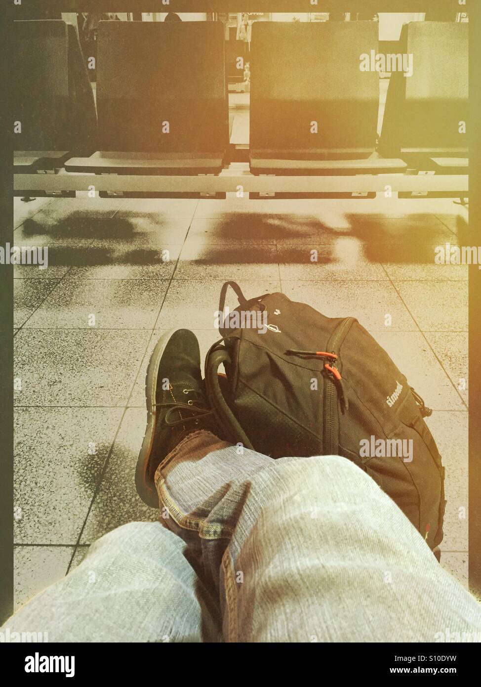 Waiting for a plain or train - Smartphone Captured Stock Image