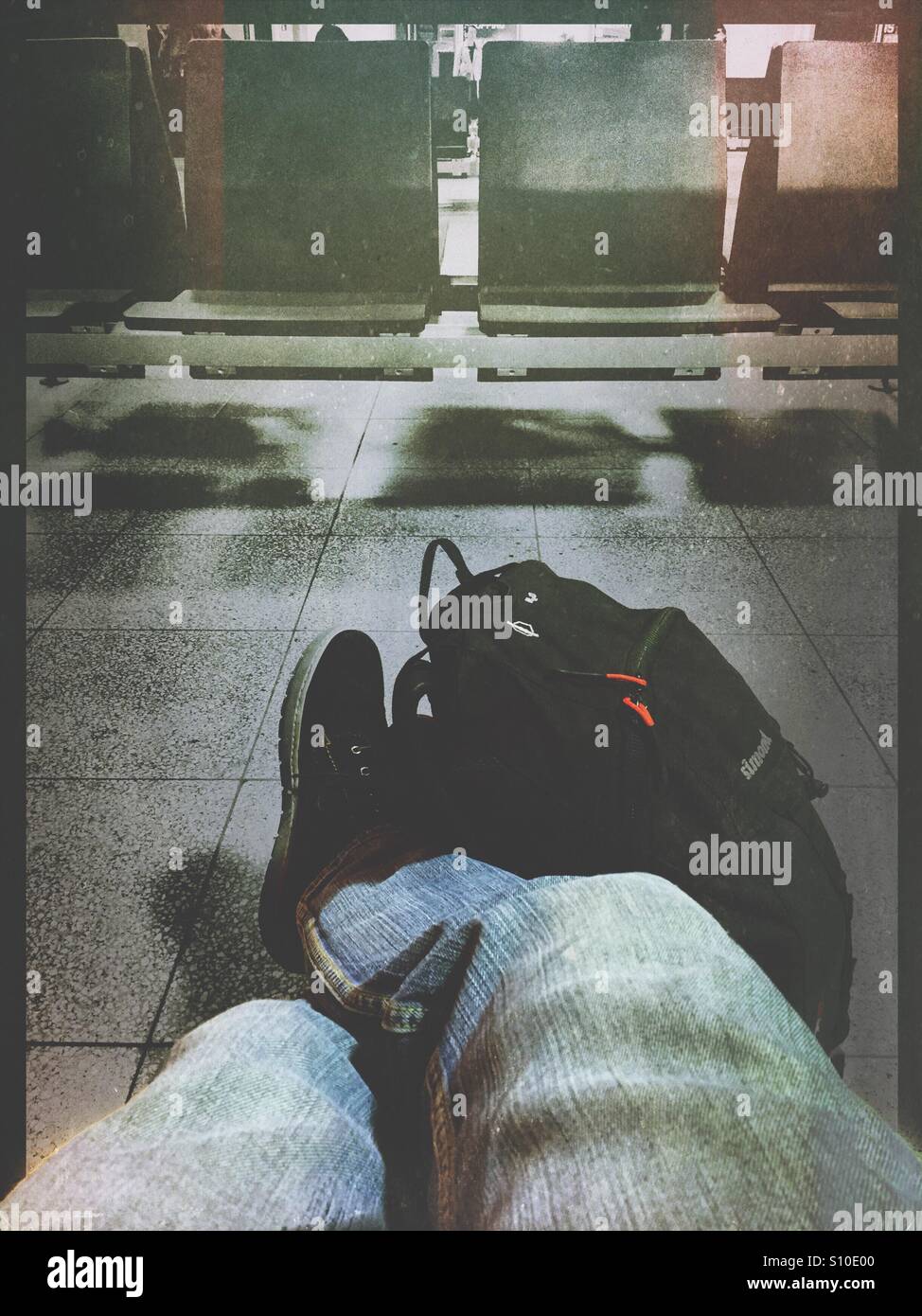 Waiting for a plane or train - Smartphone Captured Stock Image