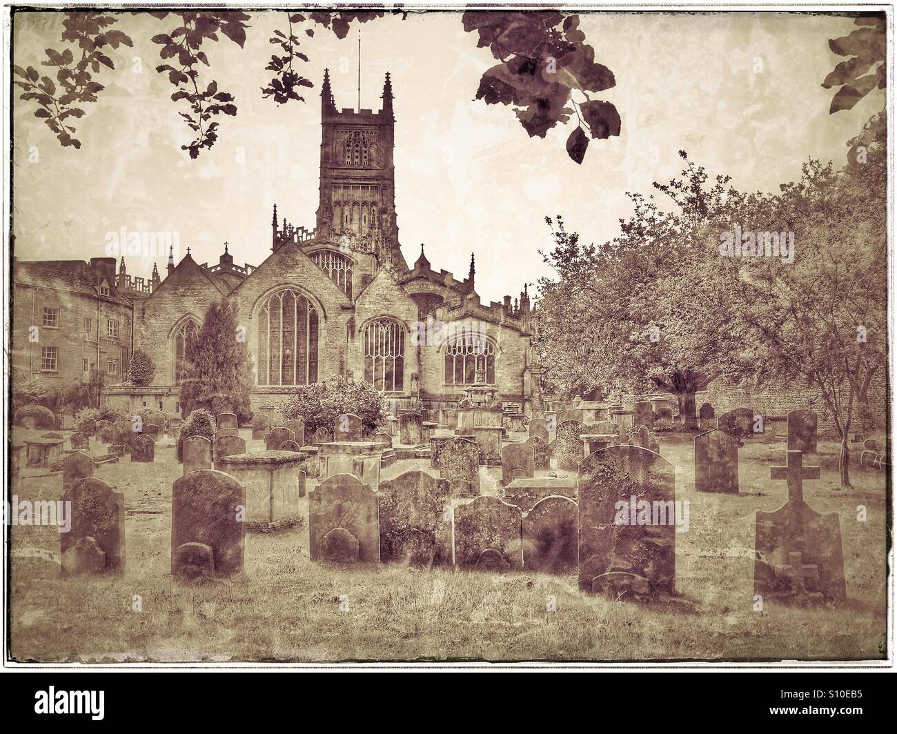An antique effect picture of the Anglican St John Baptist Parish Church and Burial Ground/Graveyard in Cirencester, Gloucestershire, England. Photo Credit - © COLIN HOSKINS. - Smartphone Captured Stock Image