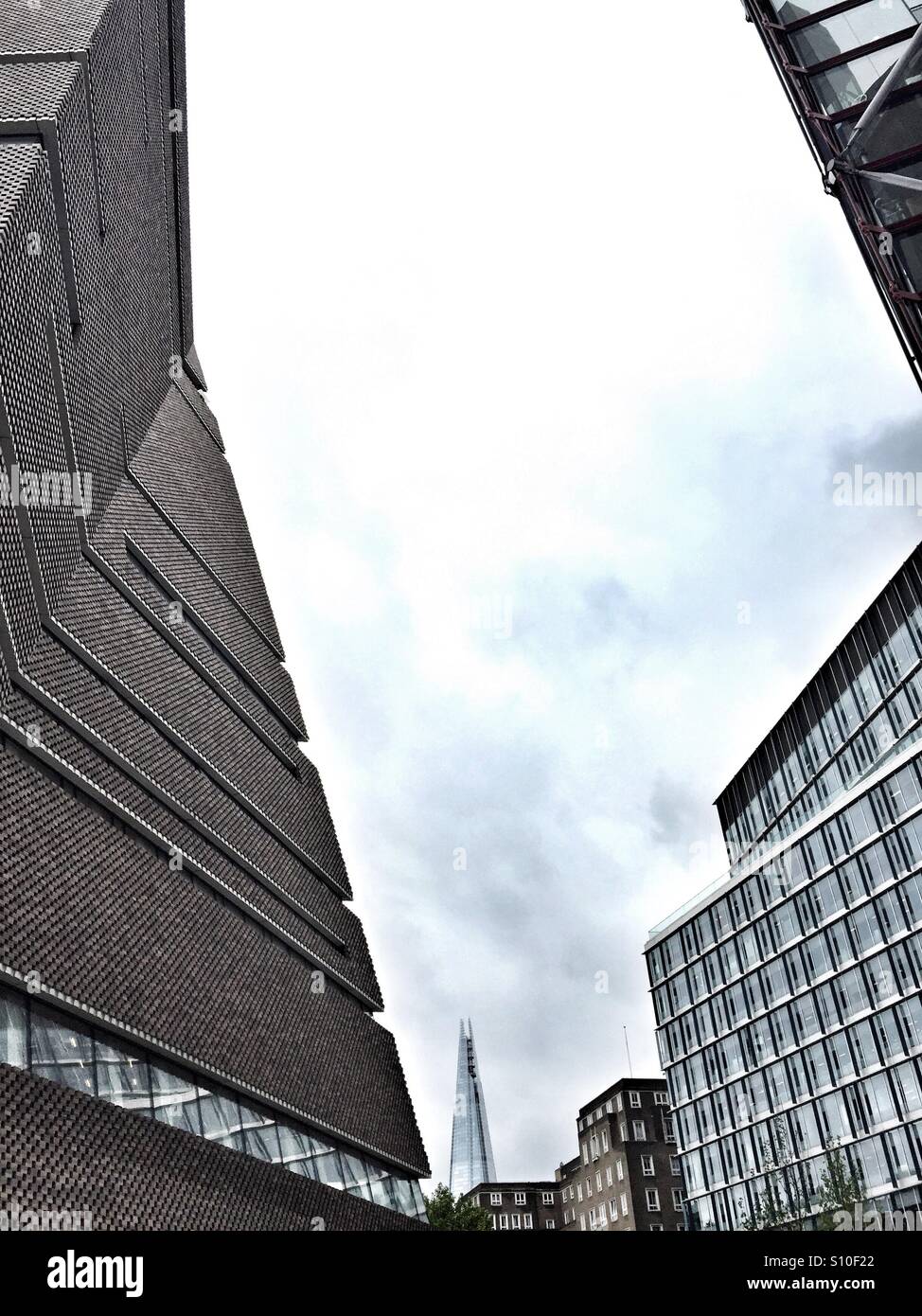 New wing of the Tate Modern in the contemporary development, Bankside on the Southbank, with the Shard in the distance - Smartphone Captured Stock Image