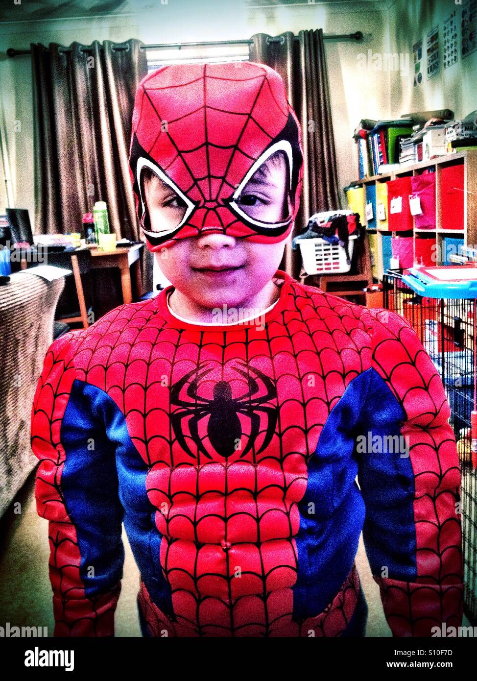 A young boy dressed in a Spider Man costume Stock Photo Alamy