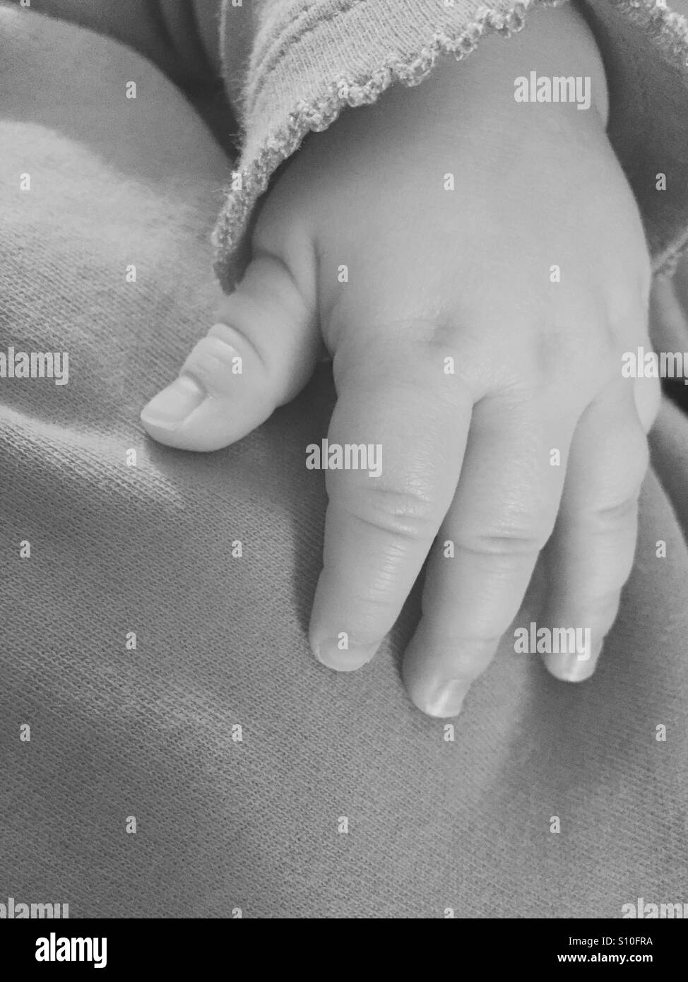 Baby fingers Stock Photo