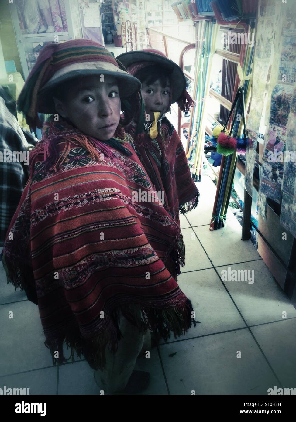 Two Peruvian boys in traditional attire - Smartphone Captured Stock Image