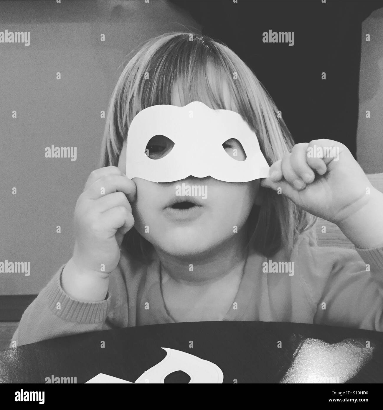 Toddler with mask Stock Photo Alamy