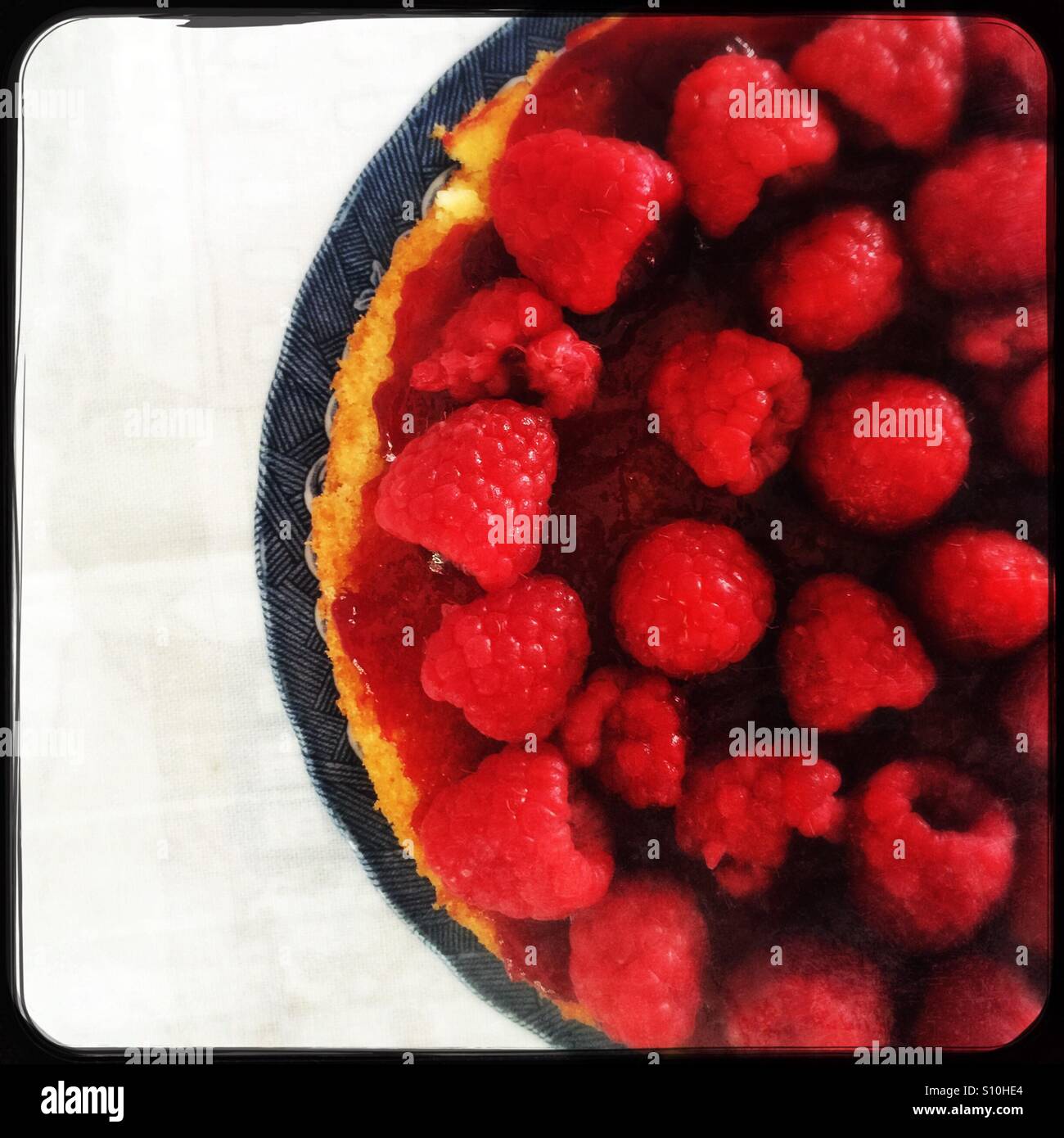 Half a raspberry cake, taken from above Stock Photo