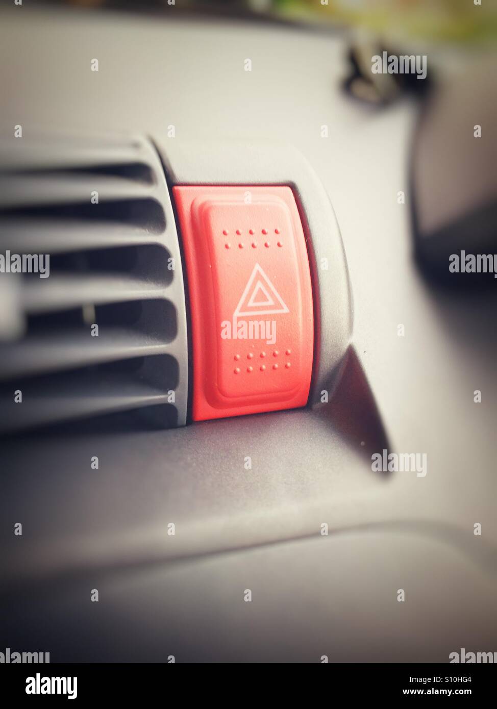 Hazard warning light button Stock Photo Alamy