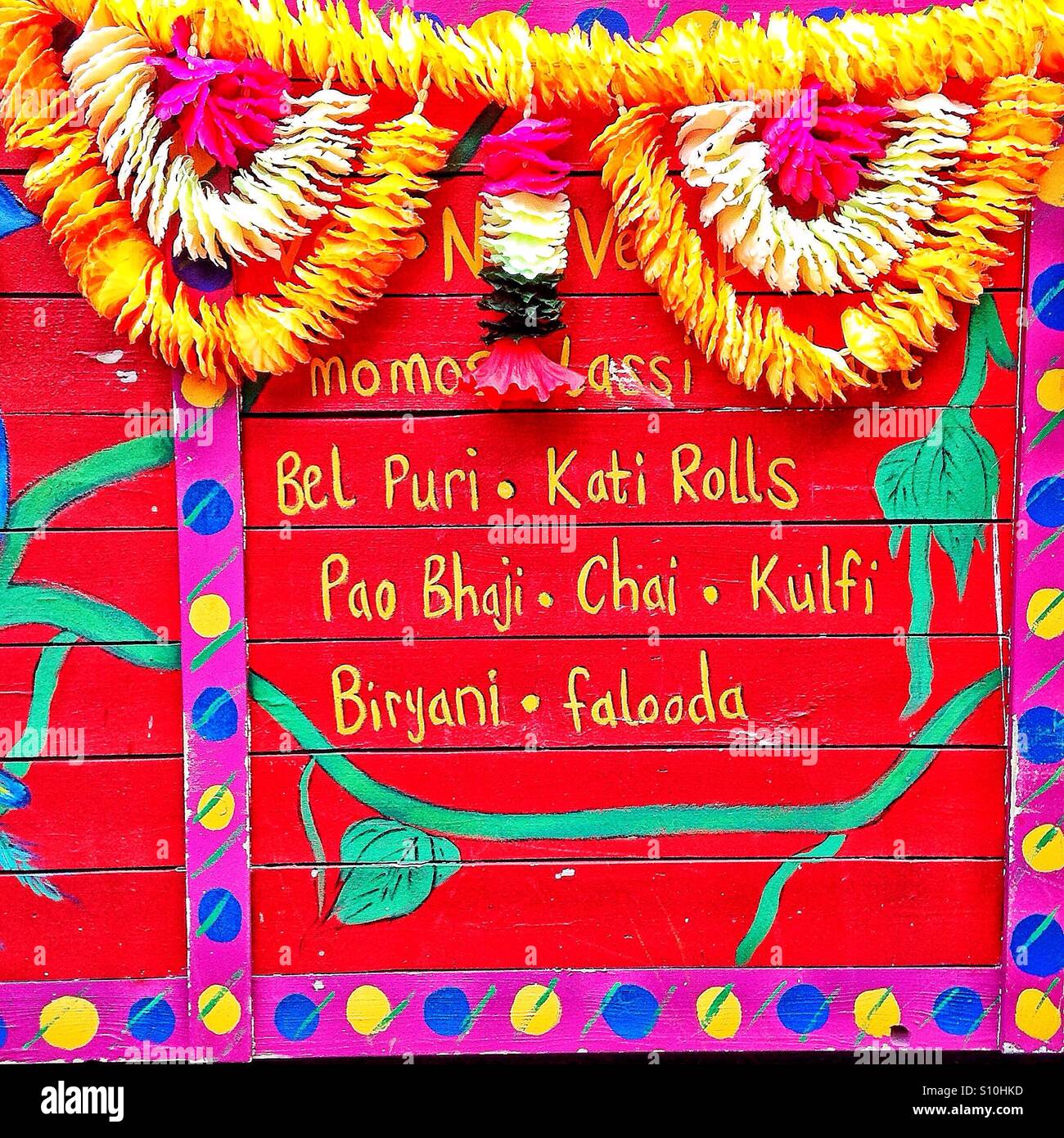 Brightly coloured indian street food stand Stock Photo Alamy