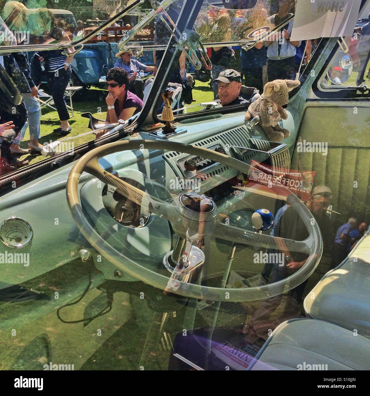 A classic VW split screen camper van at a car show in England - Smartphone Captured Stock Image