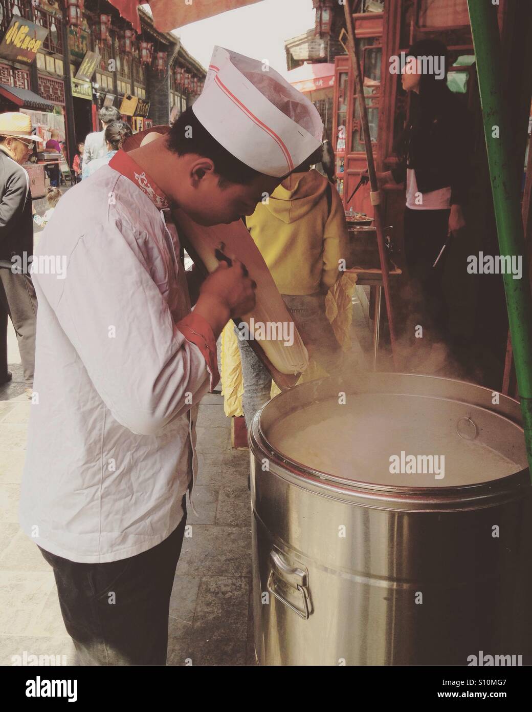 Chinese noodles cooking - Smartphone Captured Stock Image