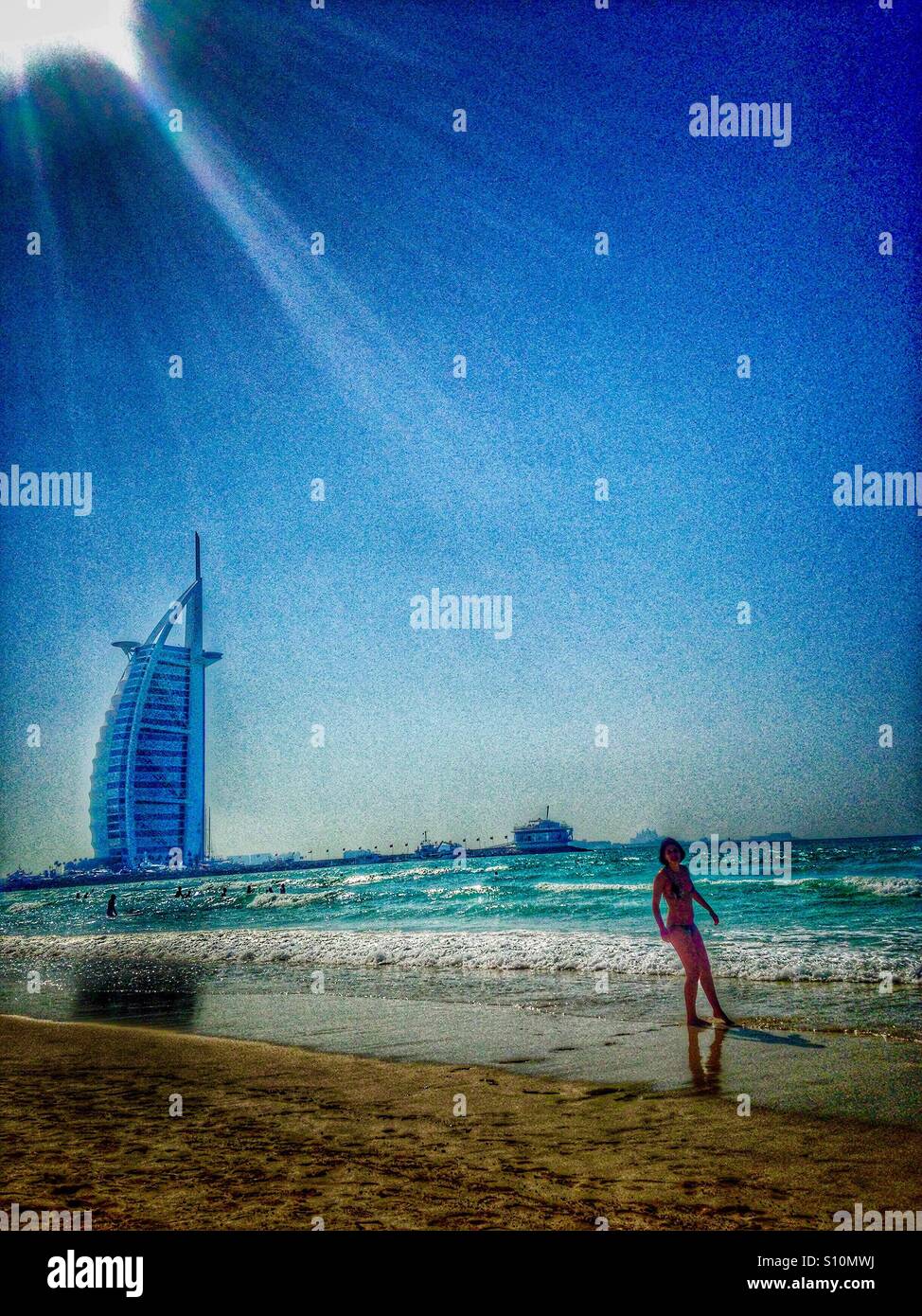 Dubai beach woman hires stock photography and images Alamy