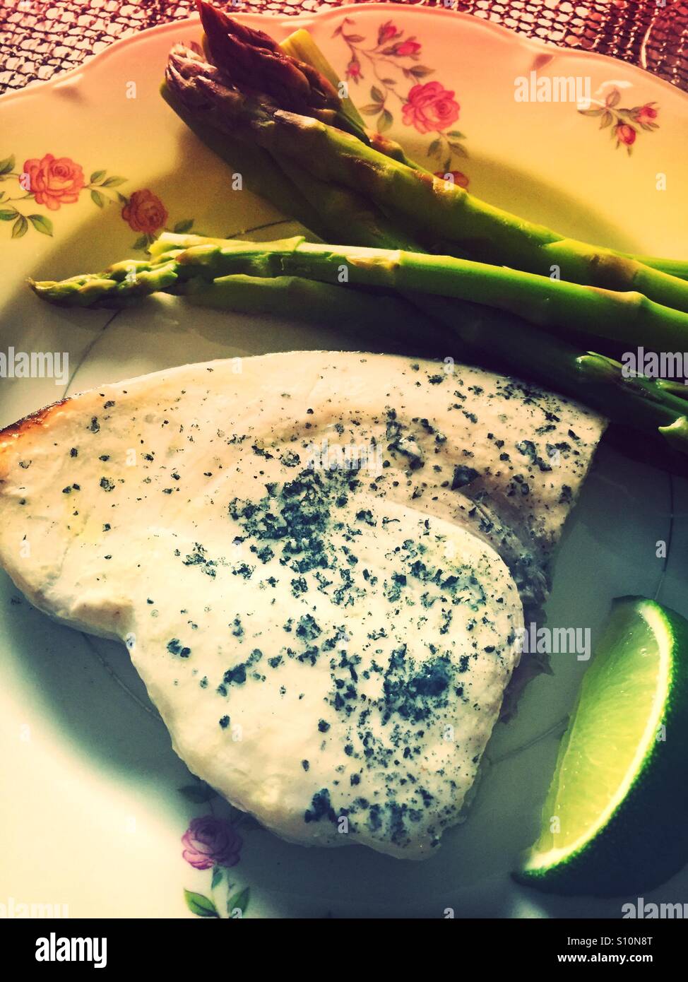 Swordfish steak meal with asparagus - Smartphone Captured Stock Image