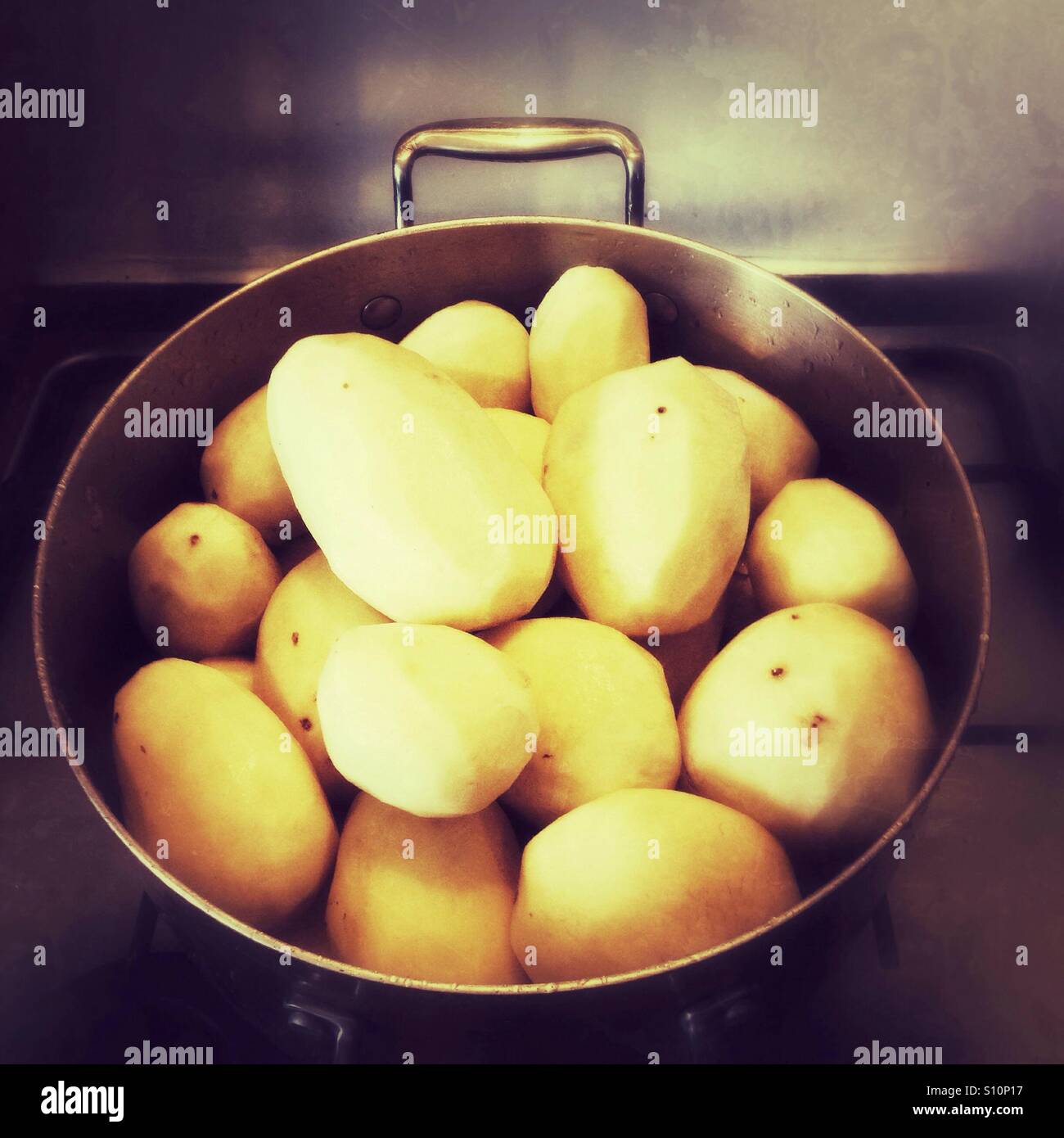 Large pan of peeled potatoes - Smartphone Captured Stock Image