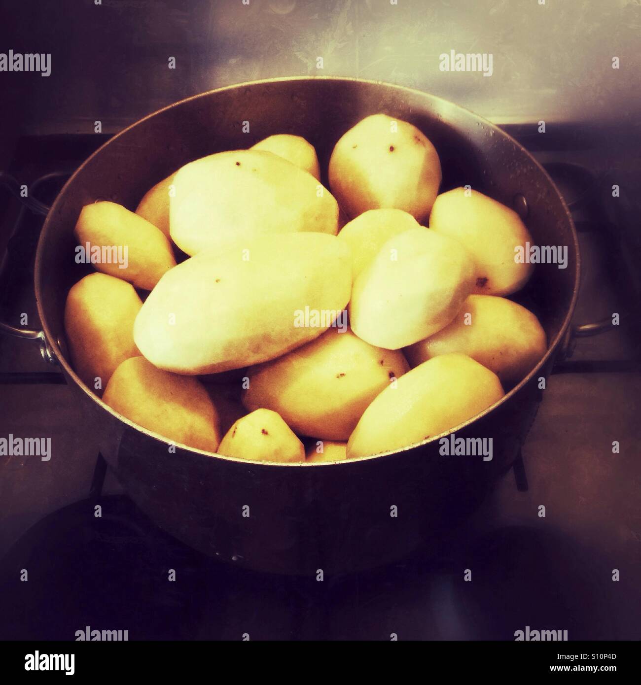 Pan filled with peeled potatoes - Smartphone Captured Stock Image