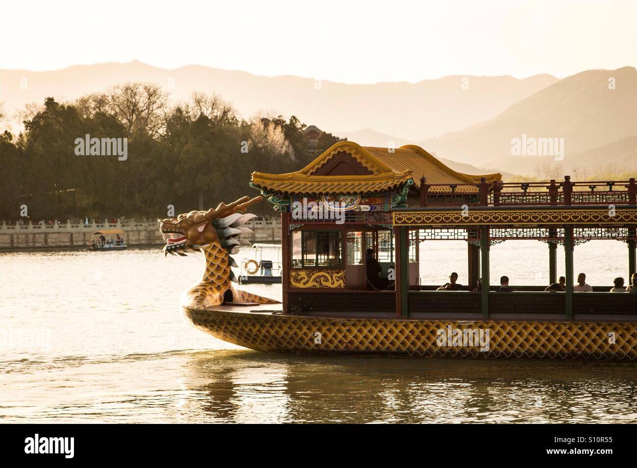Chinese boat with dragon on the lake in China - Smartphone Captured Stock Image