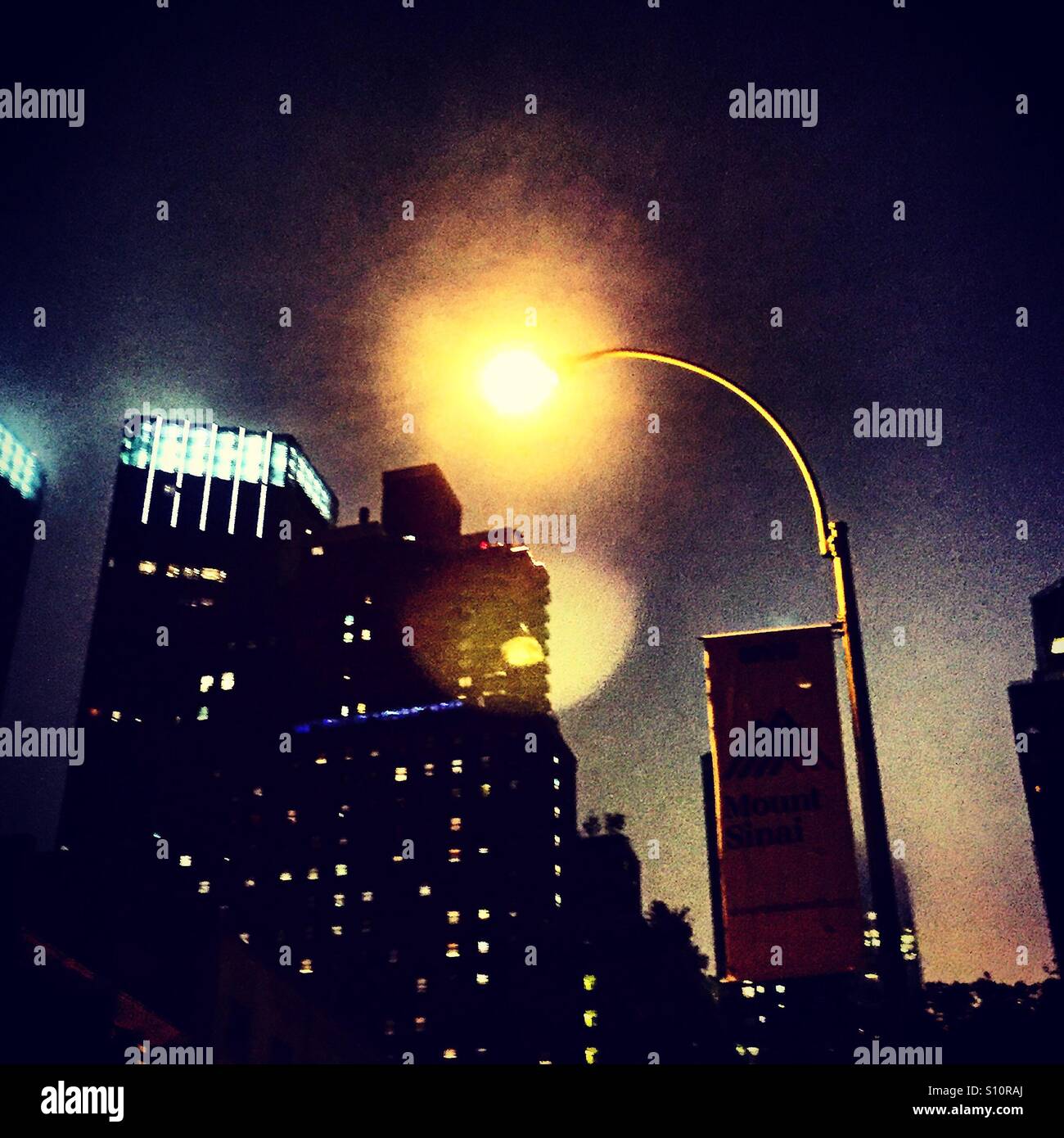 New York City by street light Stock Photo Alamy