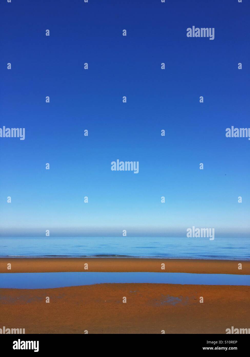 Blue sky, sea and sandy beach abstract Stock Photo