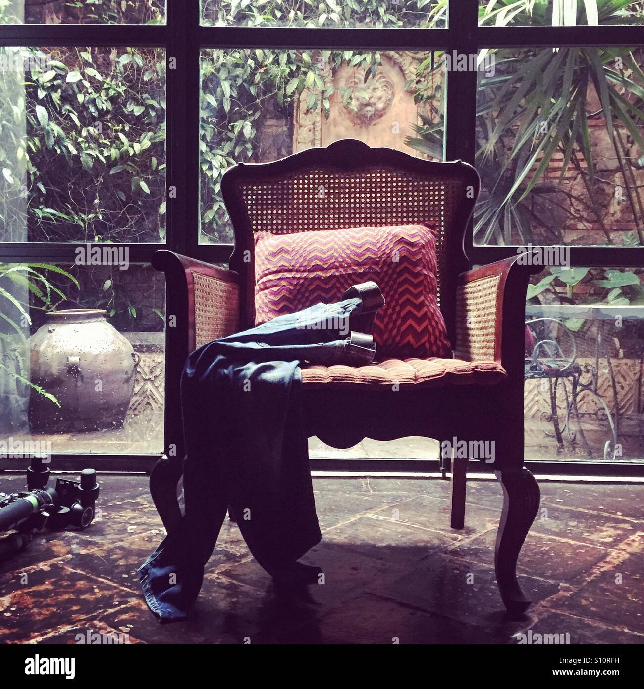 Chair by window Stock Photo - Alamy