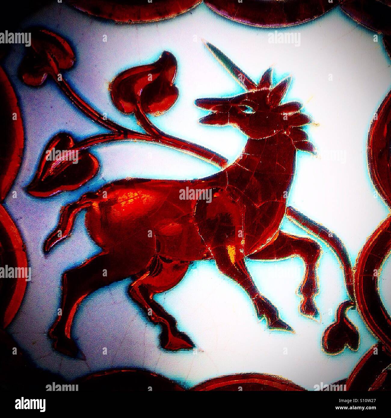 A olden unicorn decorates a ceramic tile in Algodonales, Sierra de Cadiz, Andalusia, Spain - Smartphone Captured Stock Image