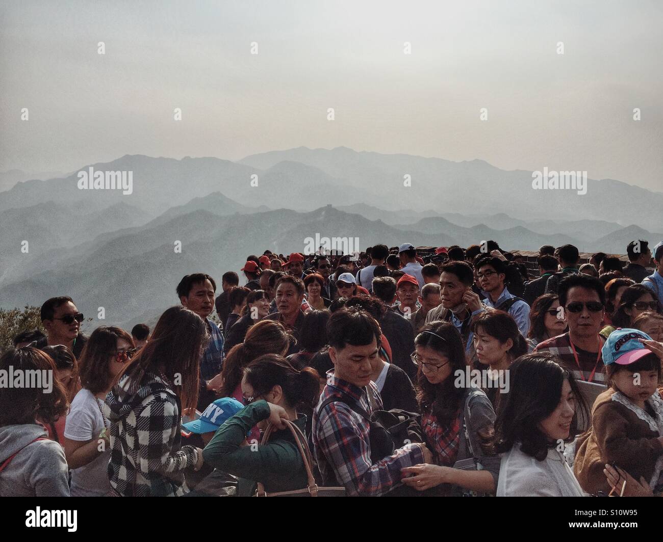 Chinese Tourists in the Great wall of China Stock Photo