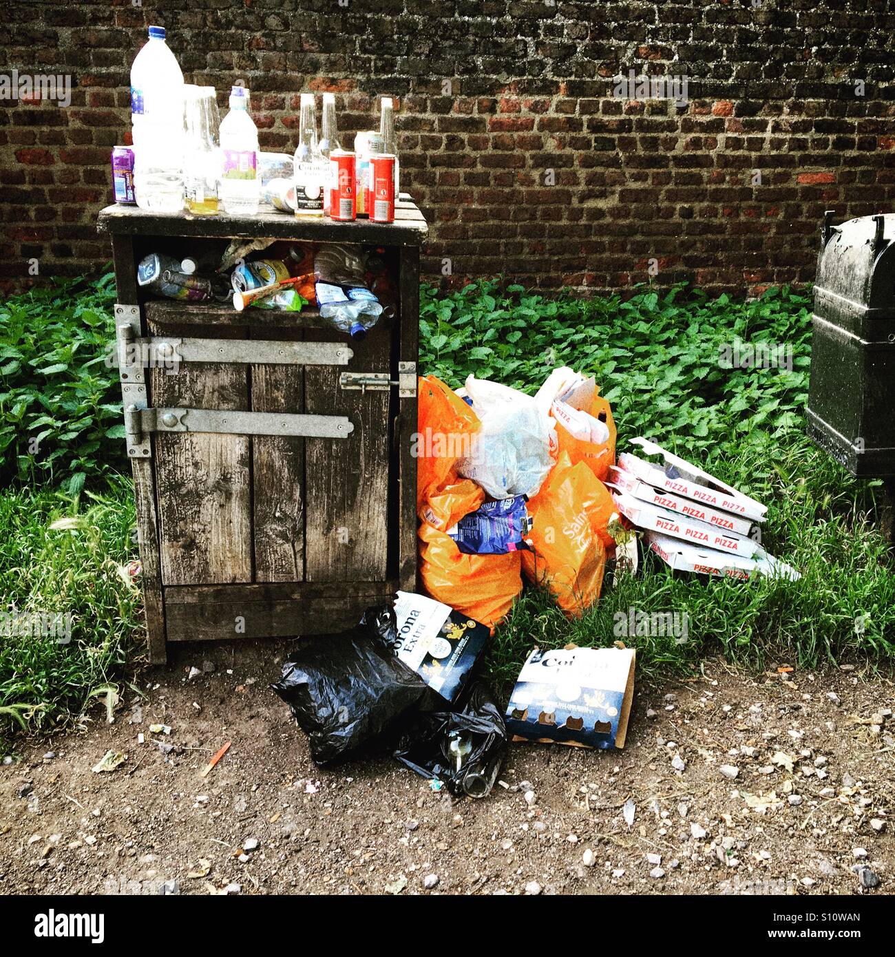 Litter left behind after a sunny day, Hampton Hill Gate, Bushy Park. South West London - Smartphone Captured Stock Image