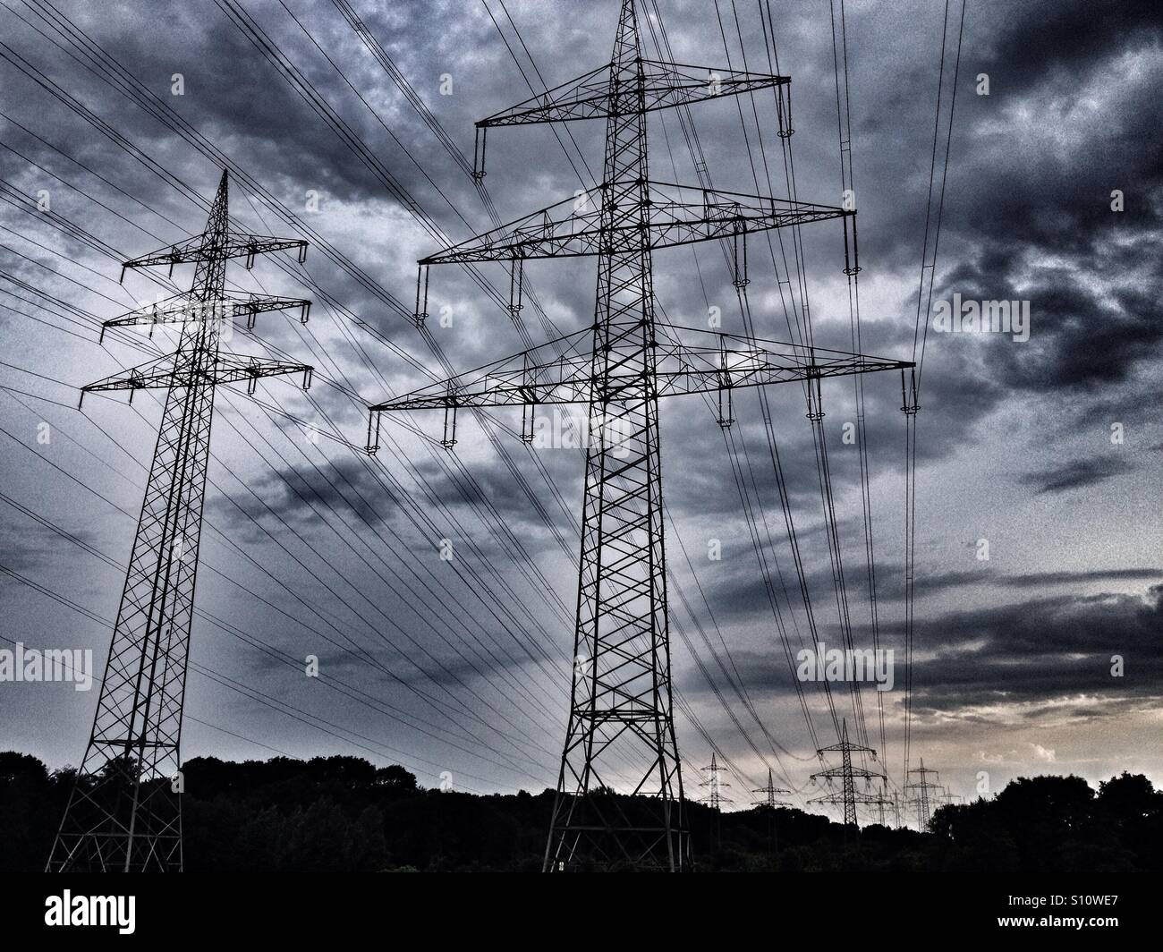 High-voltage electricity lines supplying electric to the German grid from coal-fired power stations in the Rhineland. - Smartphone Captured Stock Image