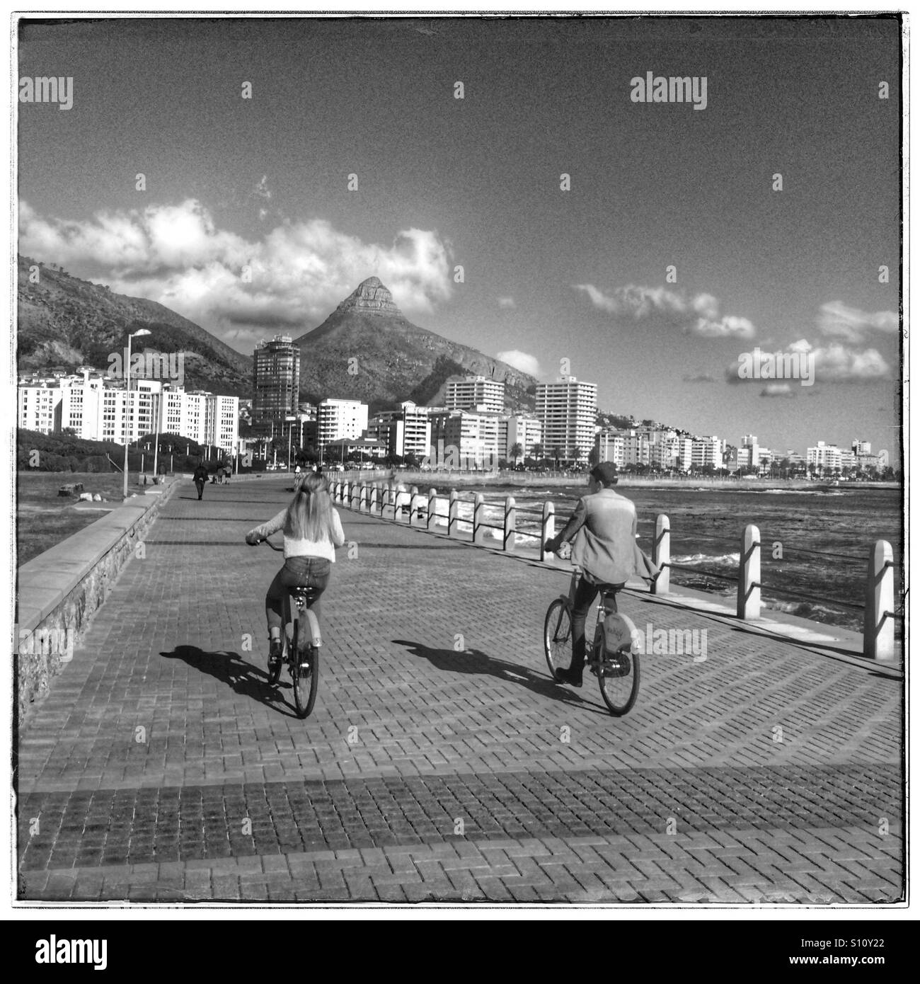 Cycling along the promenade Black and White Stock Photos & Images - Alamy