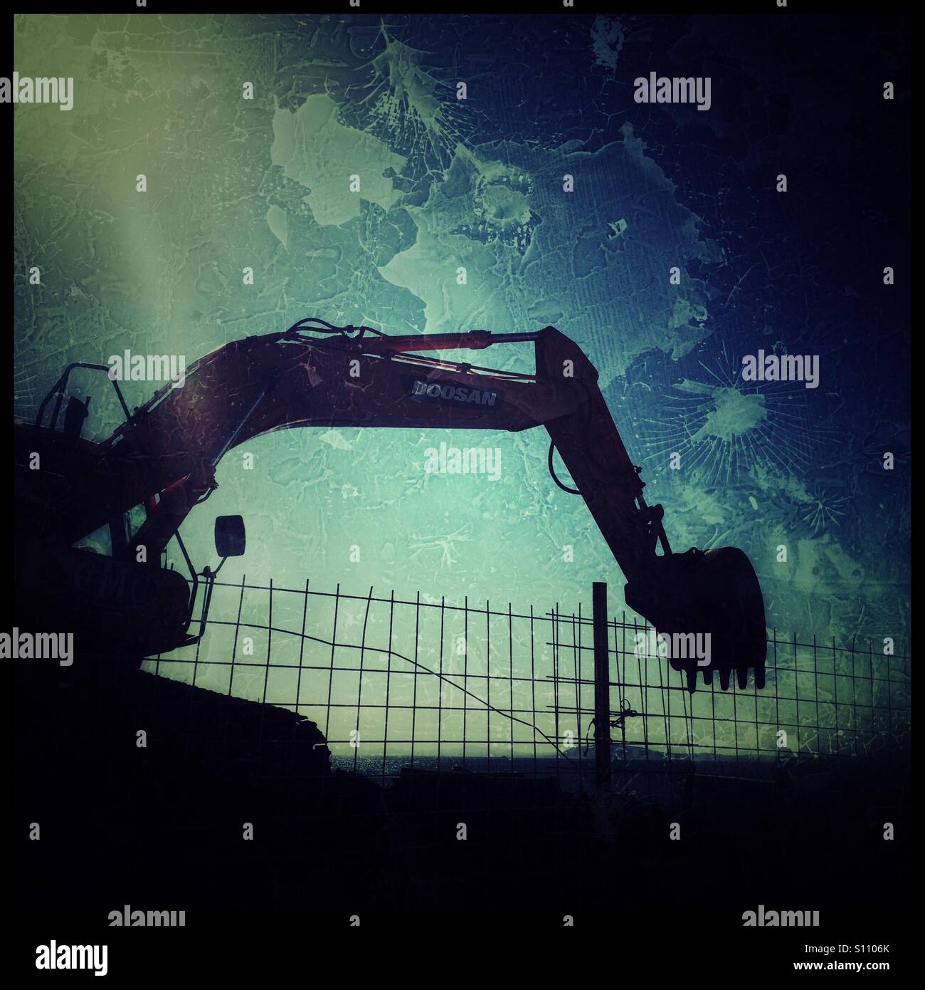 Silhouette of digger, heavy use of filters. - Smartphone Captured Stock Image