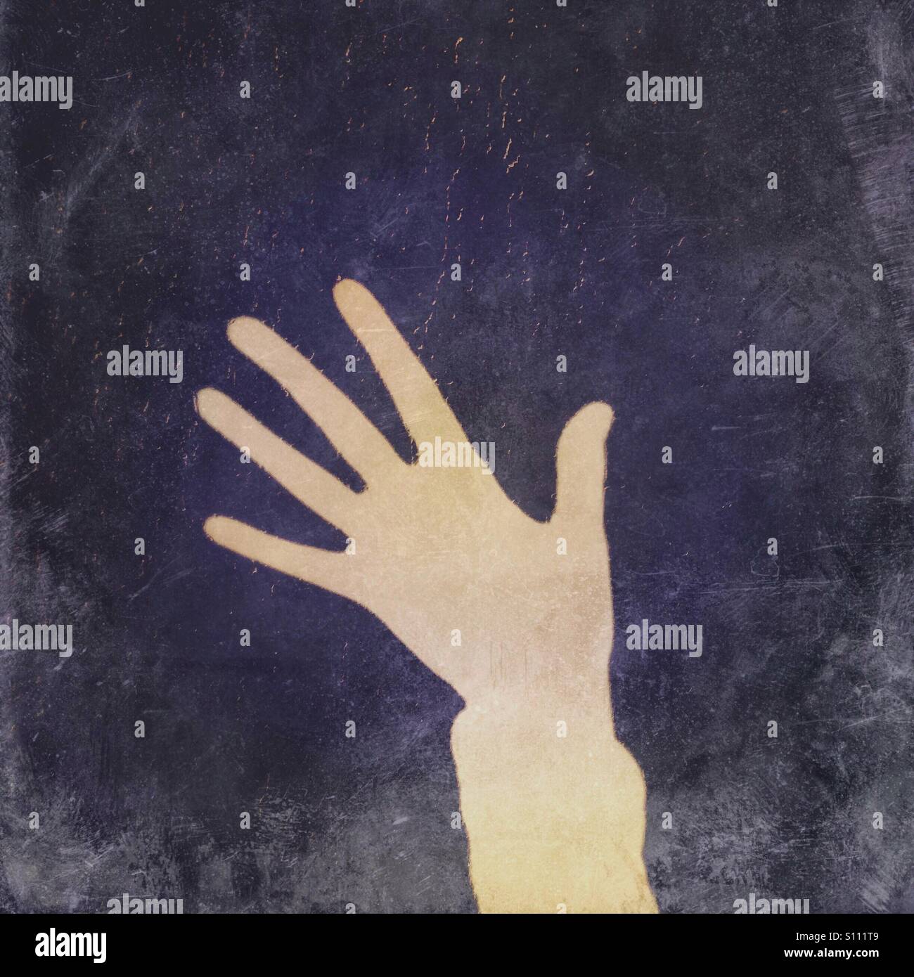 Shadow of a hand showing five fingers - Smartphone Captured Stock Image