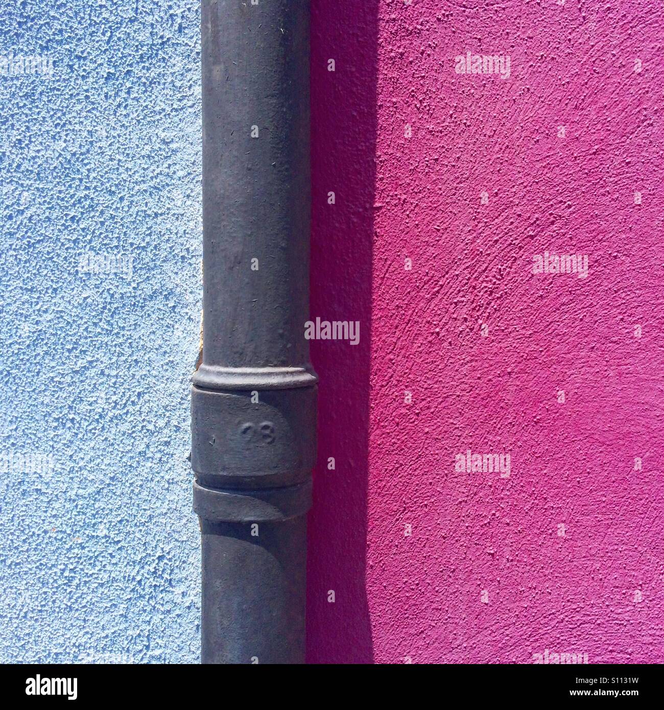 Two walls and a water pipeline Stock Photo Alamy