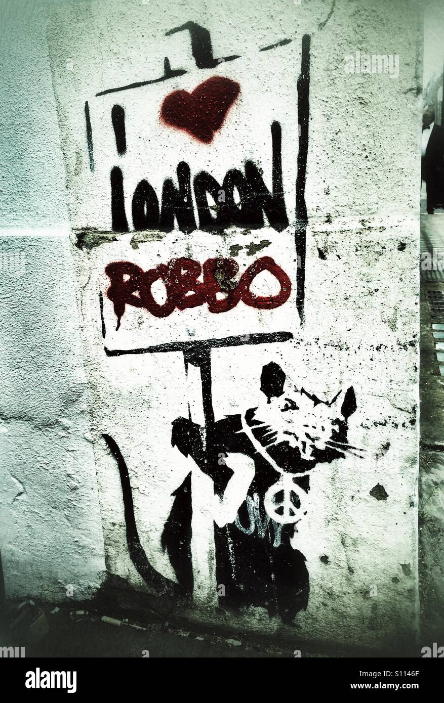 'I love London' graffiti - rat holding a placard done Banksy style but signed by Robbo. Stock Photo