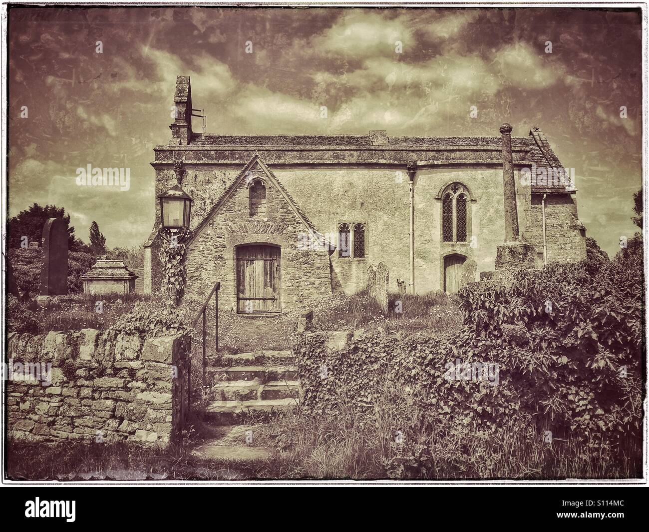 An exterior view of the Anglican St. John the Baptist Church in Inglesham, Wiltshire, England. This Church is now in the care of The Churches Conservation Trust. Photo Credit - © COLIN HOSKINS. - Smartphone Captured Stock Image