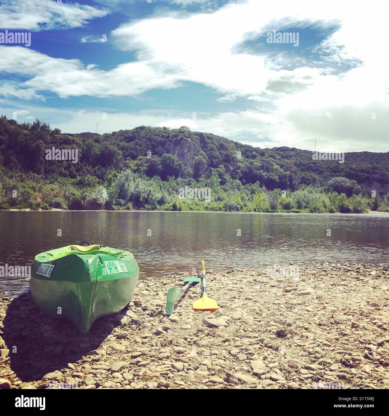Kayak on the bank of the River Gardonne, Gard, Languedoc Roussillon, France - Smartphone Captured Stock Image