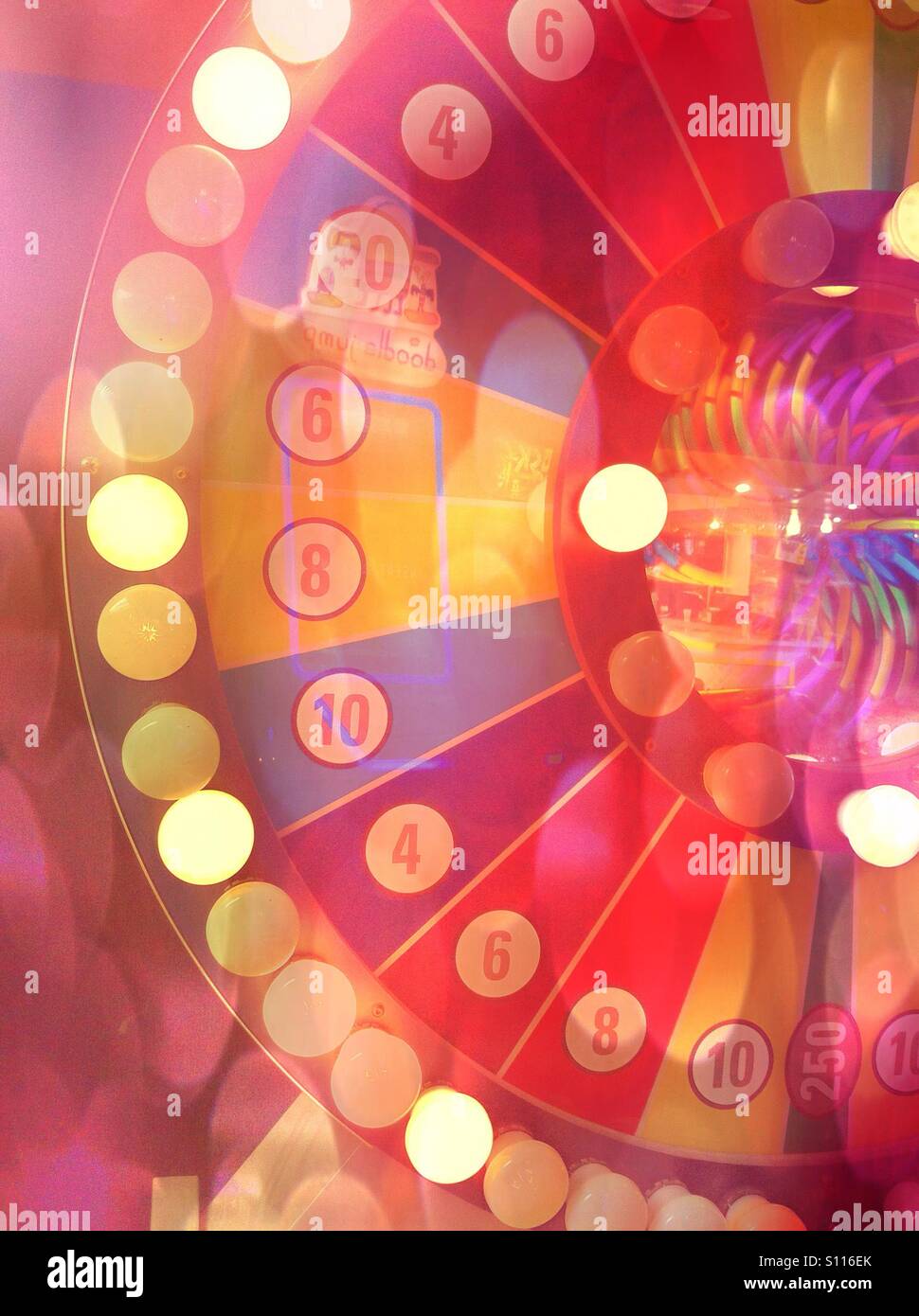 Summer carnival arcade roulette wheel Stock Photo - Alamy