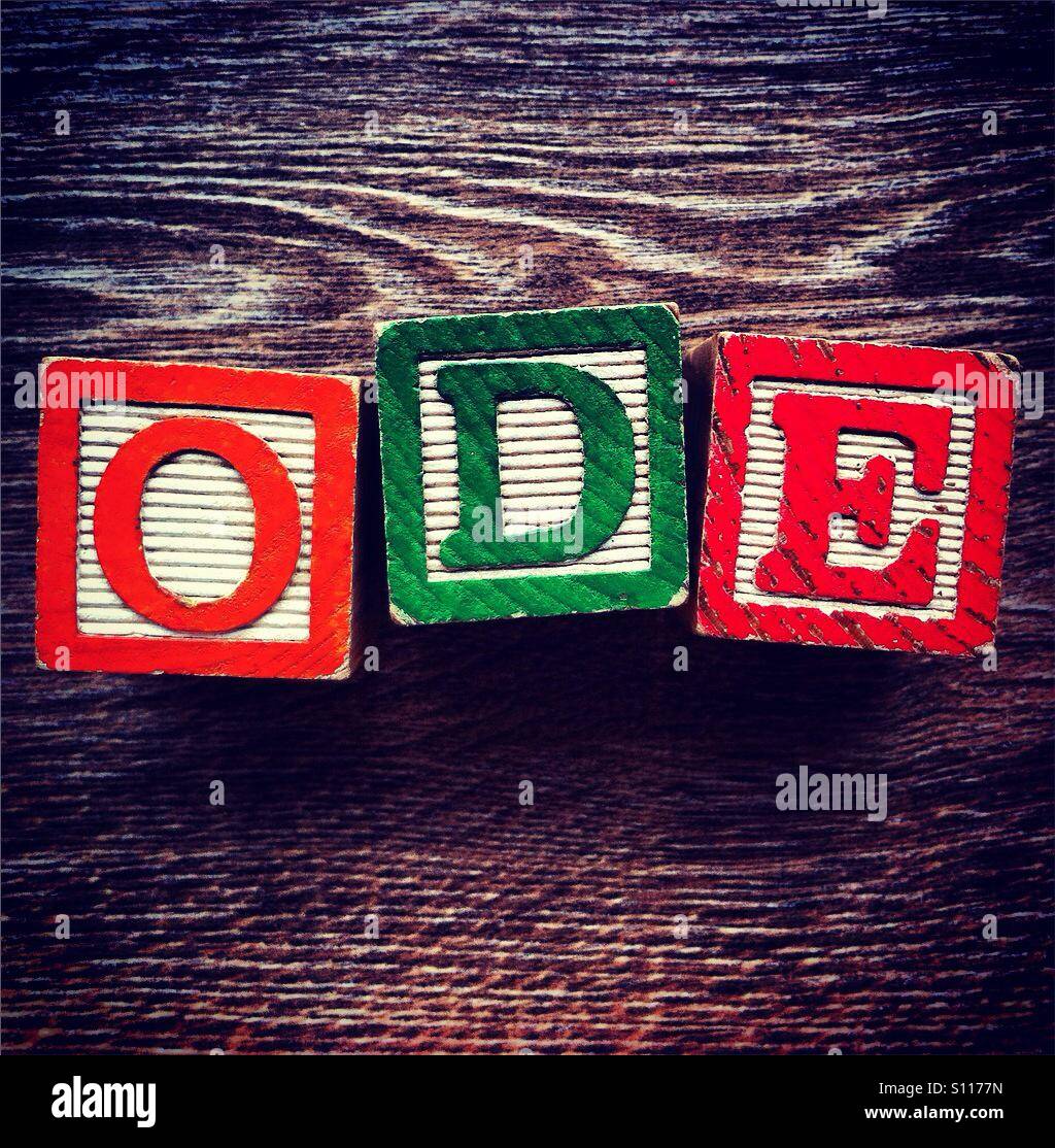 Word ODE done with wood block alphabet letters Stock Photo