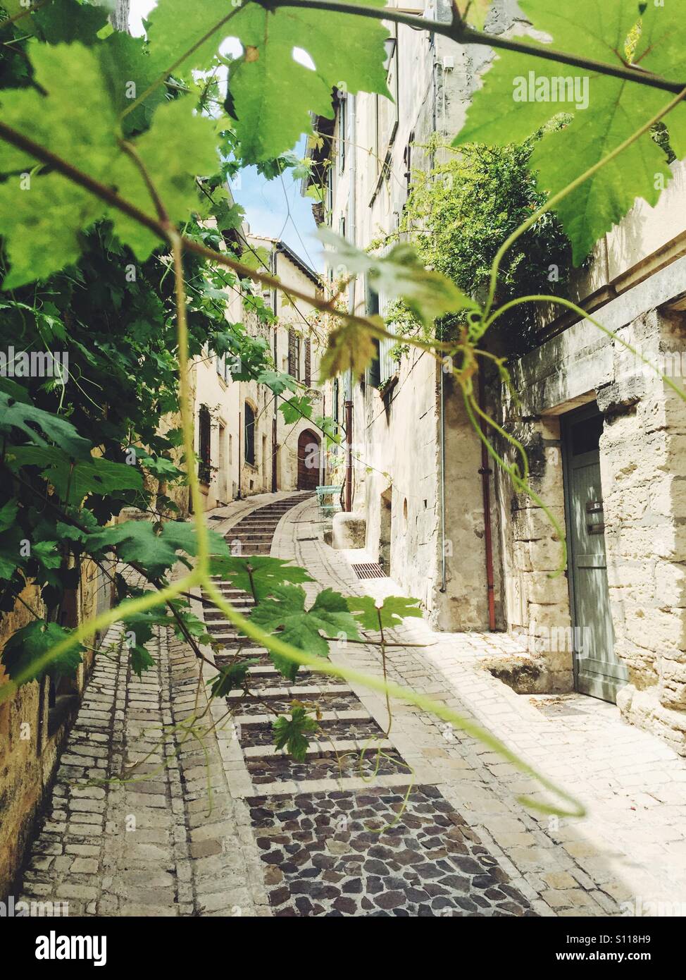 pretty quiet street in June, Uzes, Gard, Languedoc Roussillon, France - Smartphone Captured Stock Image