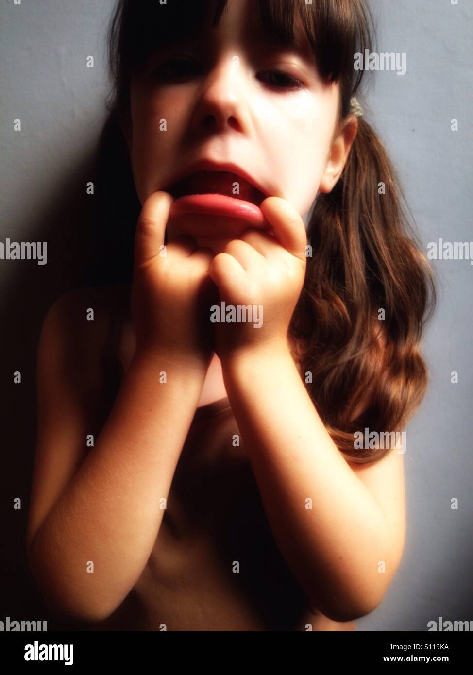 4-year old girl pulling a face - Smartphone Captured Stock Image