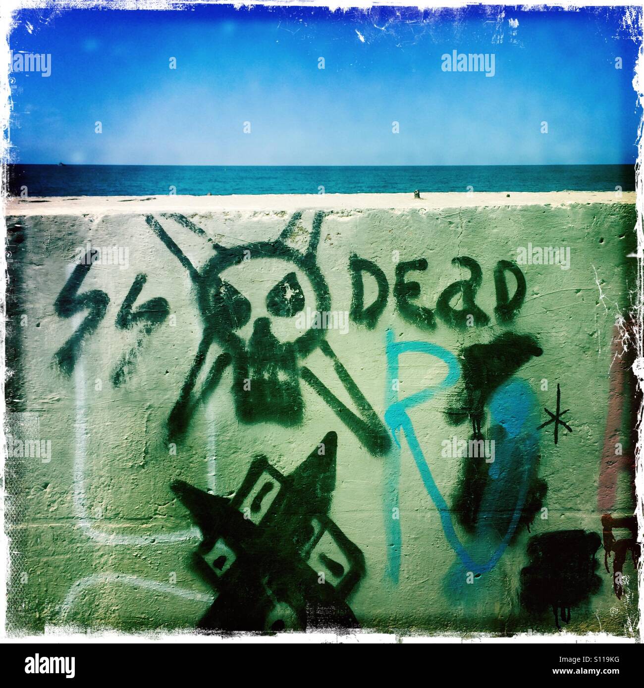 Death graffiti by Black Sea, Crimea - Smartphone Captured Stock Image