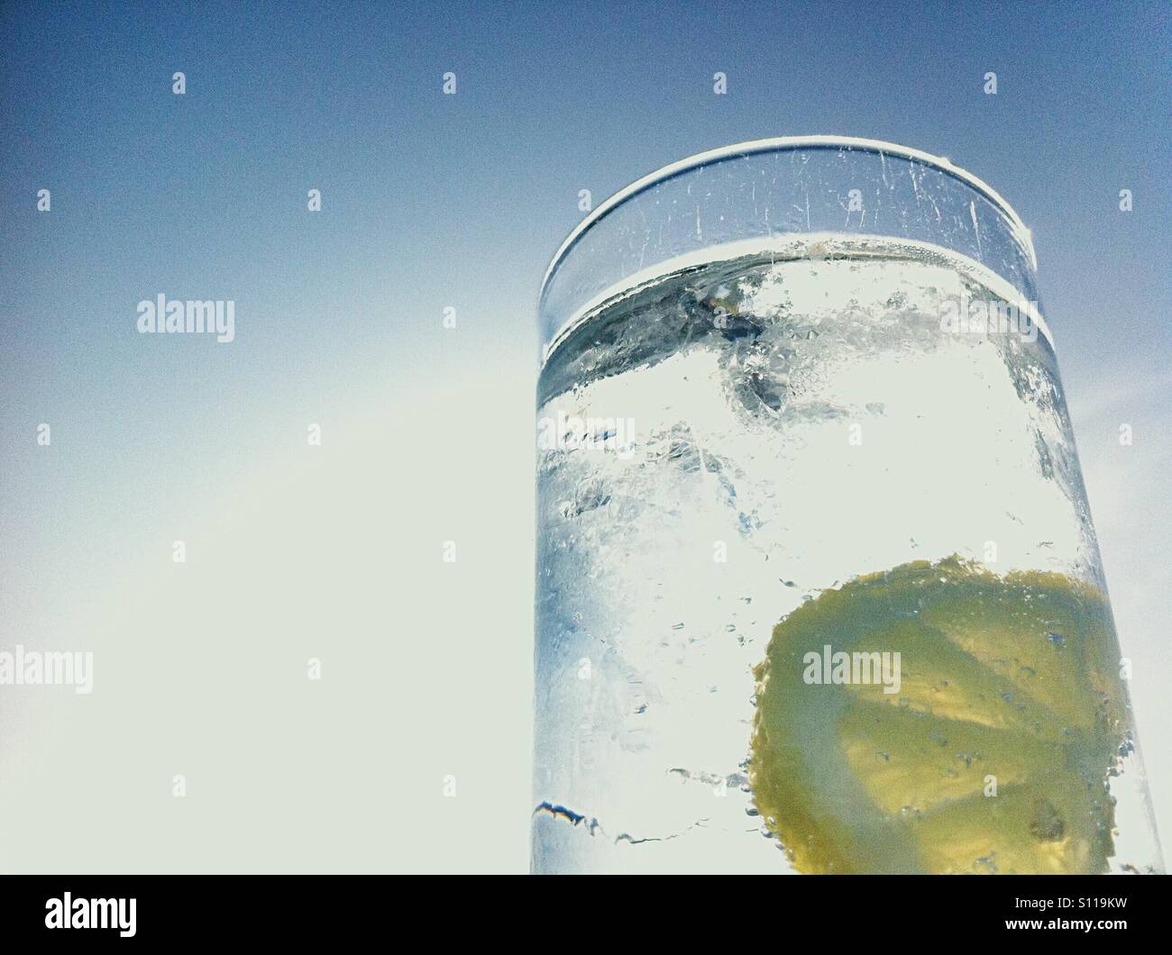Gin, tonic, ice and a slice - Smartphone Captured Stock Image