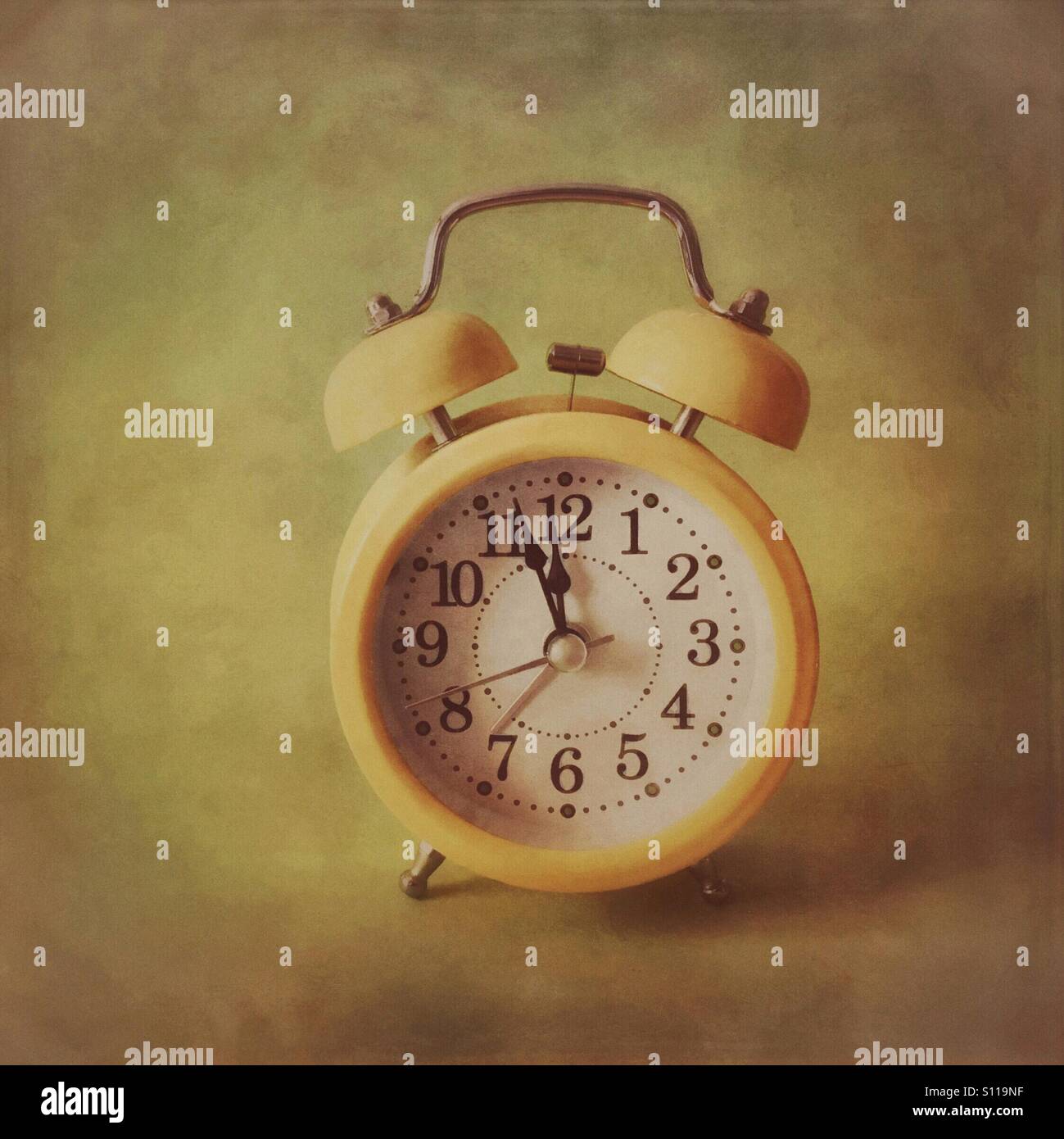 Retro alarm clock - three minutes to midnight - Smartphone Captured Stock Image